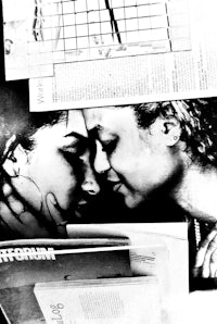 a black and white photo of a woman and a man